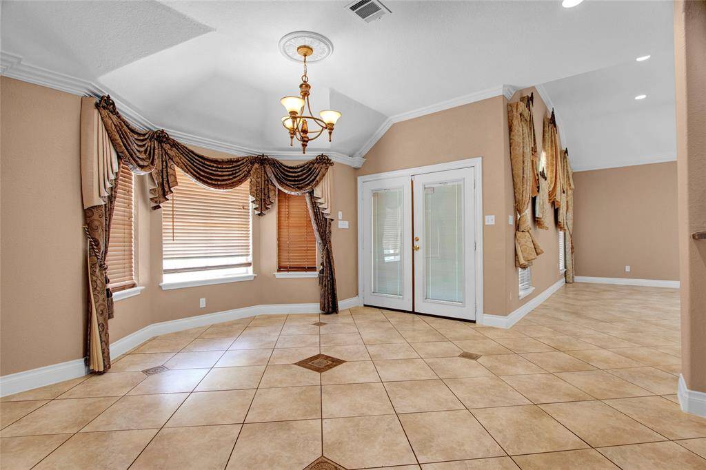 Breakfast Area, double doors leads to outside patio