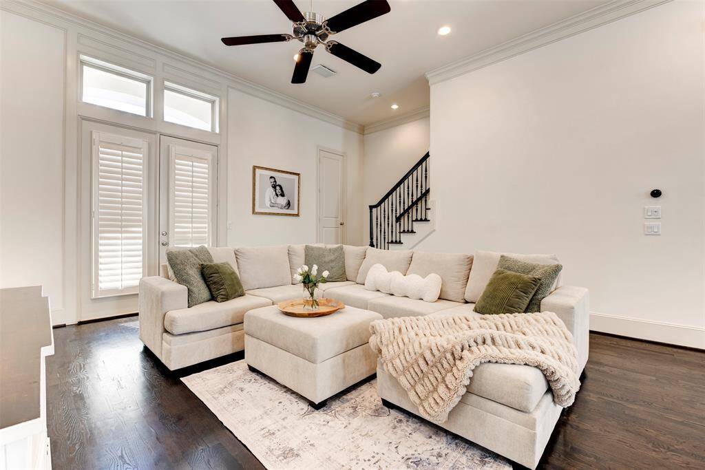 An incredible family room large enough for a big sectional. A balcony also allows for open doors on nice days!