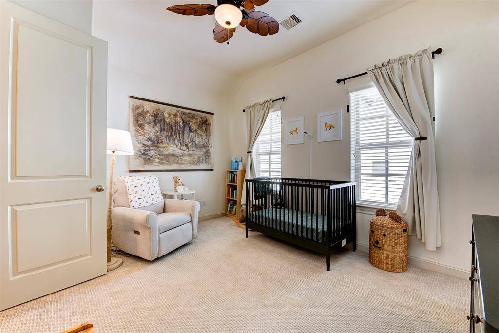 Secondary bedroom upstairs! Fits a king sized bed with nightstands.