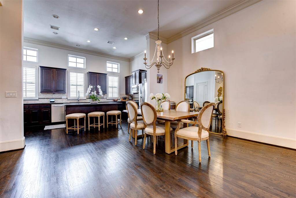 Plenty of space for an oversized dining table and cabinet for extra storage.