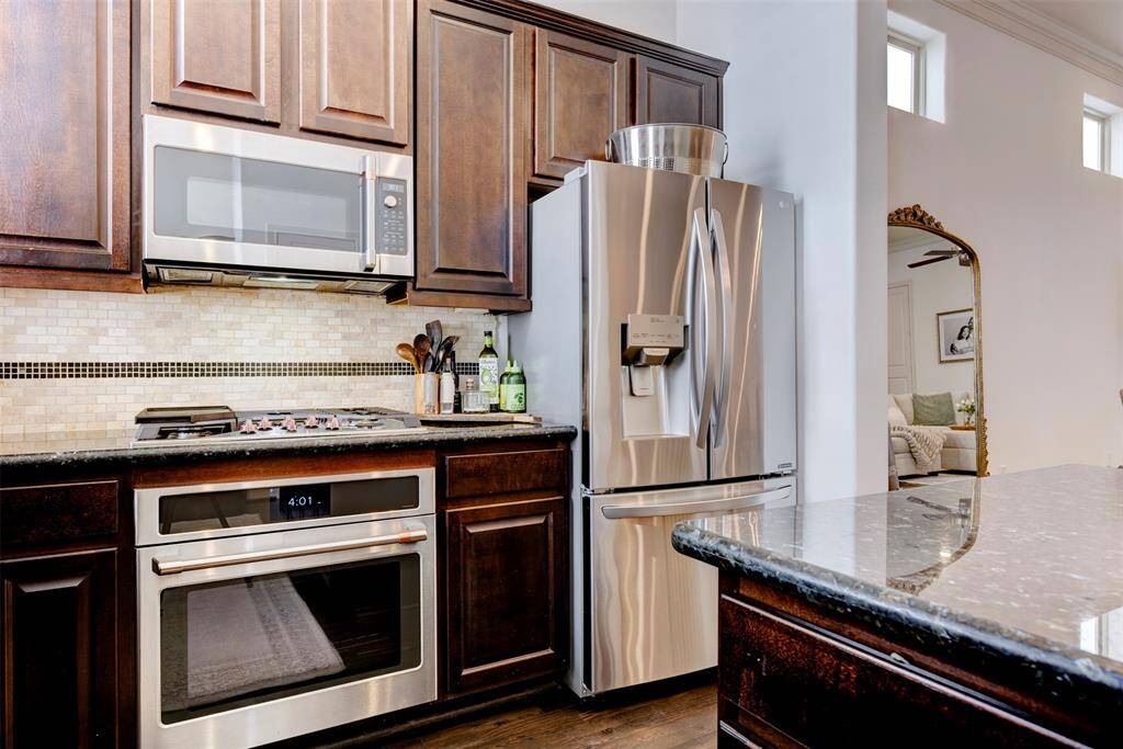 Stainless steel appliances are included.