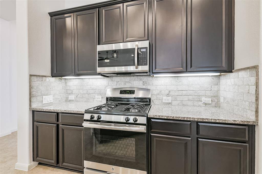 Awesome kitchen, open to the living room. Granite counters, staineless steel appliances. Great for entertaining.