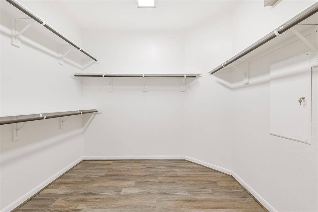 Primary walk-in closet.