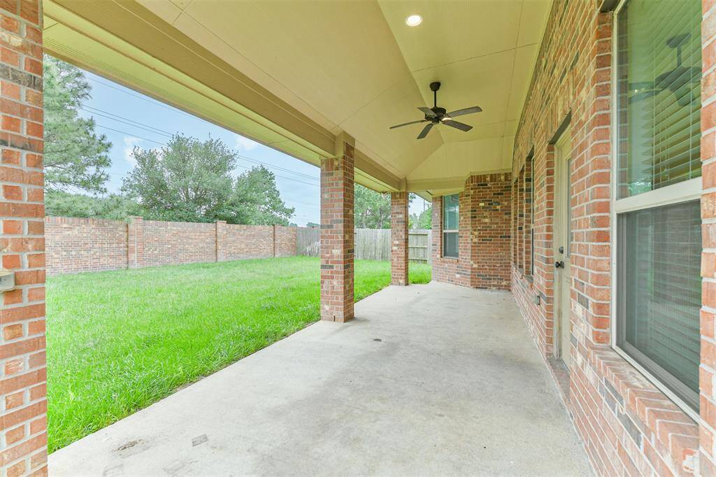 Enjoy your backyard from your covered patio.