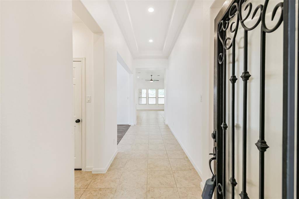 Fresh paint, flooring, lighting and more make this home shine!