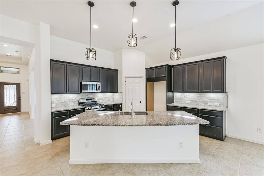 Awesome kitchen, open to the living room. Granite counters, staineless steel appliances. Great for entertaining.