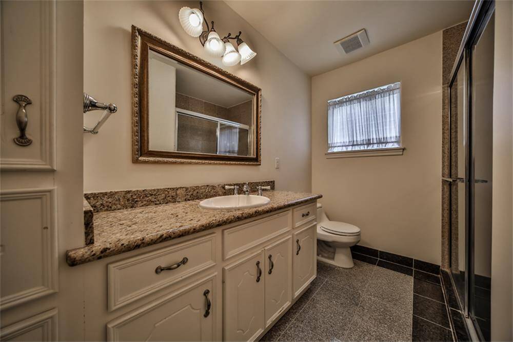 Downstairs second bedroom s full bath