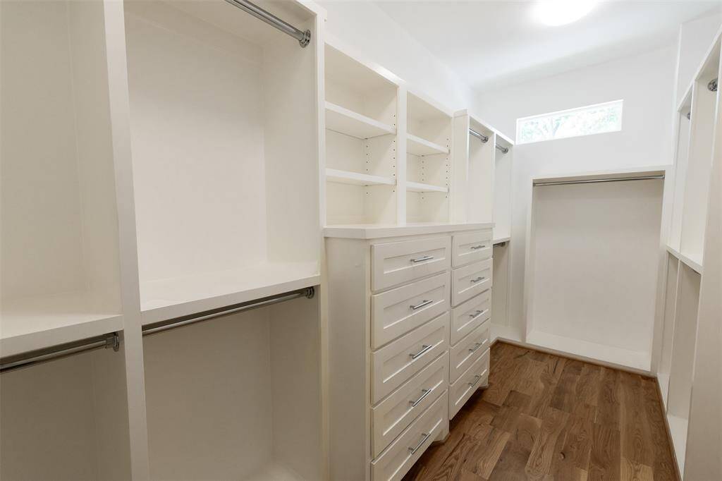 Access door in one of the secondary closets opens to large attic storage space!