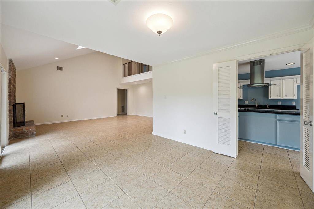 The dining room offers direct access to the kitchen, living room and backyard!