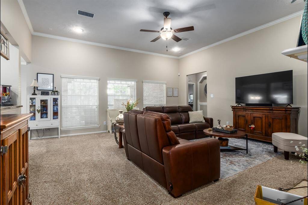 After you get to the edge of the front entry, you enter the family room. Great space and overlooks the patio and backyard. The opening on the top right, takes you into the primary bedroom.