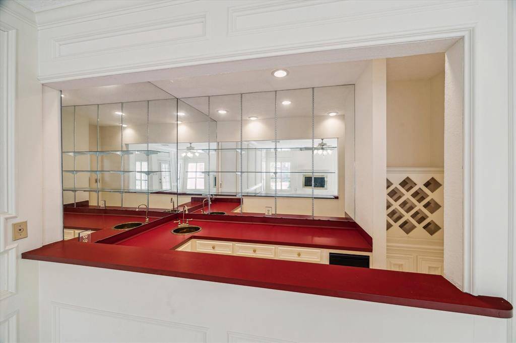 Serving wet bar located off the family room.
