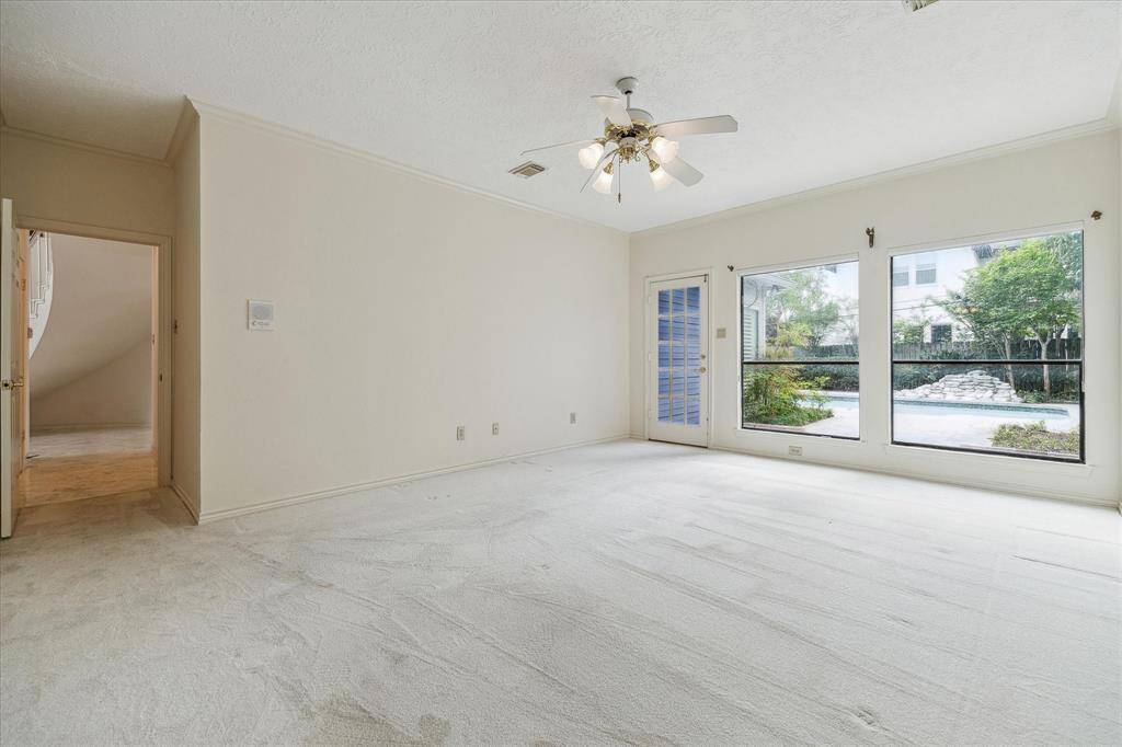 First floor spacious master suite overlooking the pool.