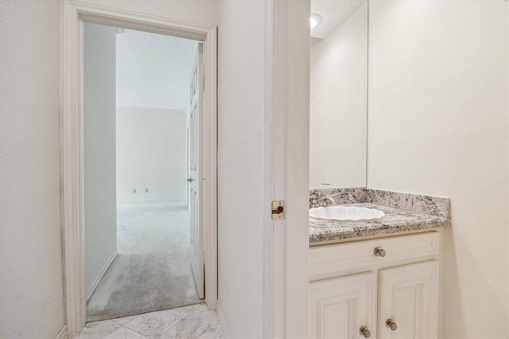 First floor powder bath located off the entry and family room area.