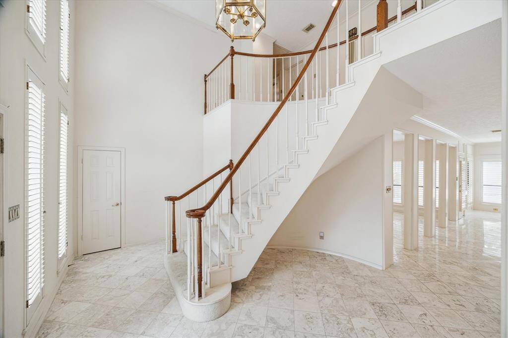 Another view of this two story entry with marble floors. Light and bright!