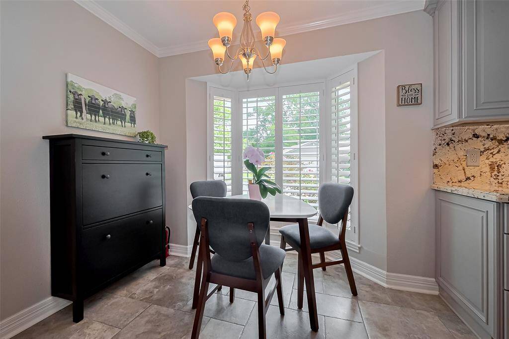 Such a pretty space.  Wood shutters add an elegant touch!