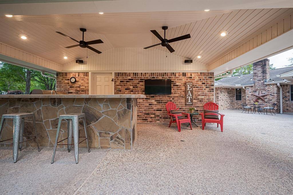 Lovely outdoor patio area in front of the outdoor fireplace