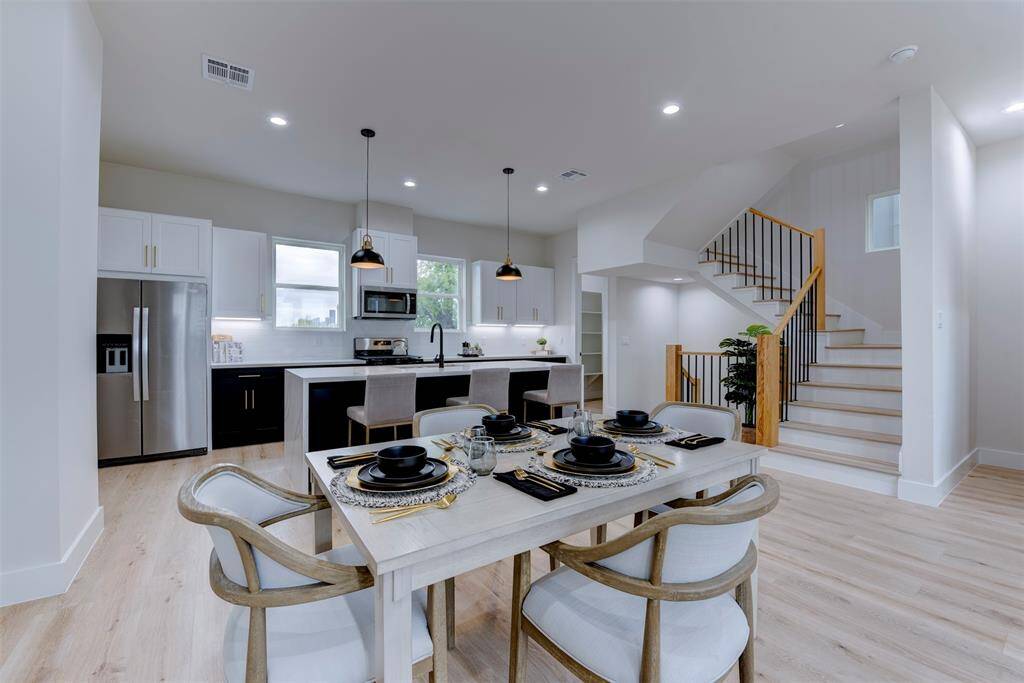 Open concept kitchen/dining/ living areas