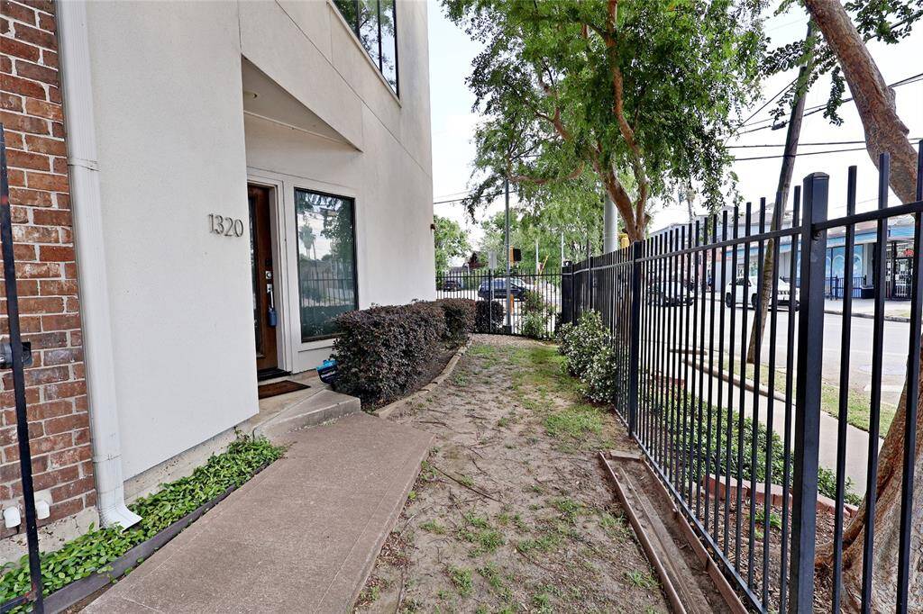 Welcoming you into a private landscaped yard space