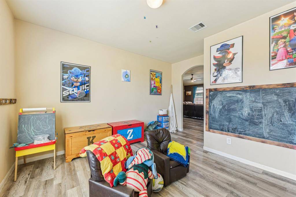Flexible office/study area. Currently utilized as a play room