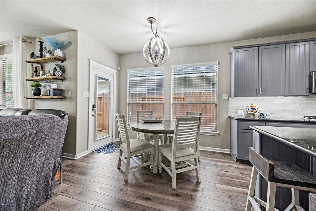 Beautiful dining space that could easily fit a circular or rectangular table set.
