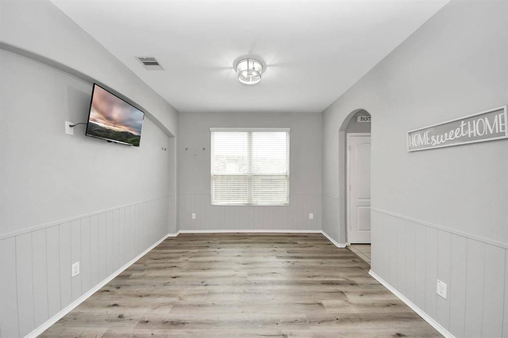 This versatile space can easily be styled as a formal dining room, playroom, or second living area—whatever fits your lifestyle best.