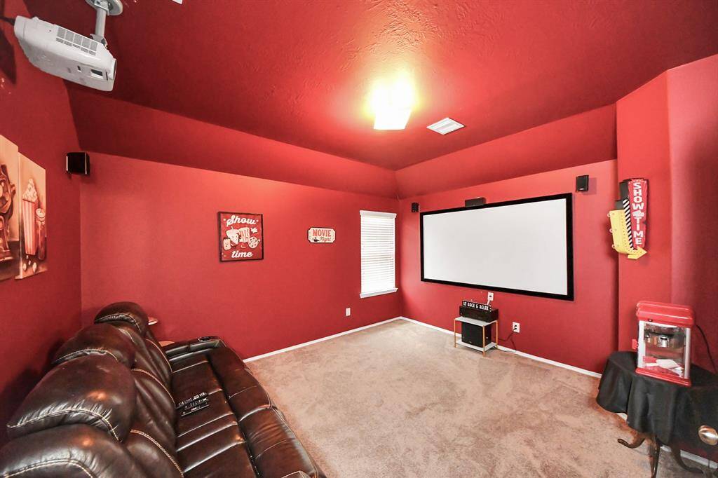 Just off the gameroom, this theatre room is ideal for movie nights or binge-watching your favorite show. Plus, the equipment stays, so you can dive right into the experience.