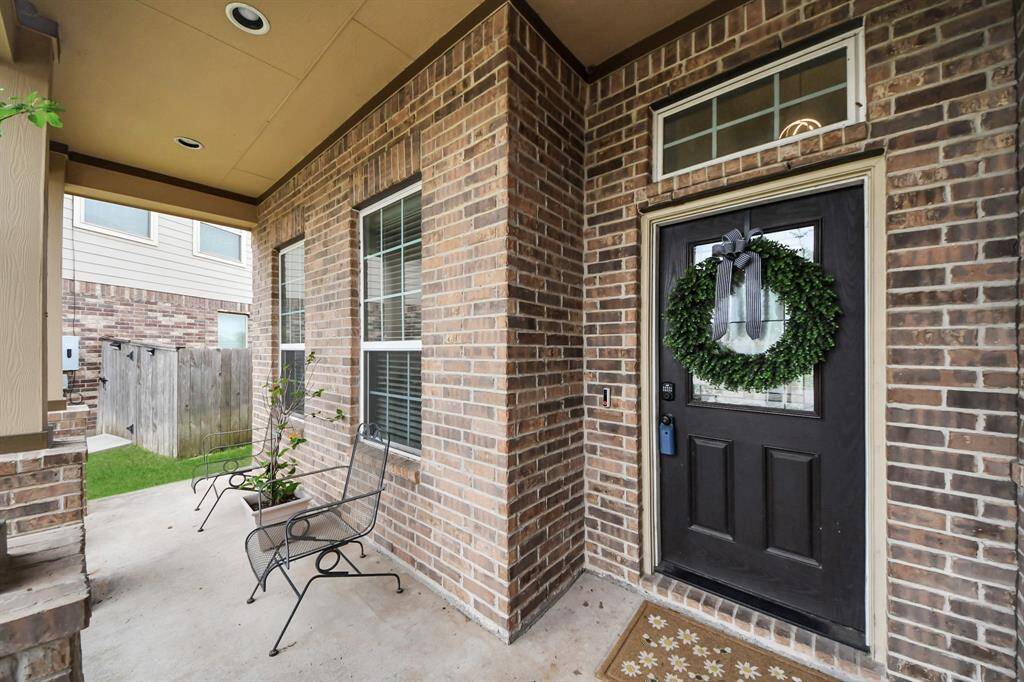Cozy front porch—perfect for morning coffee, evening chats, or simply enjoying a peaceful moment.