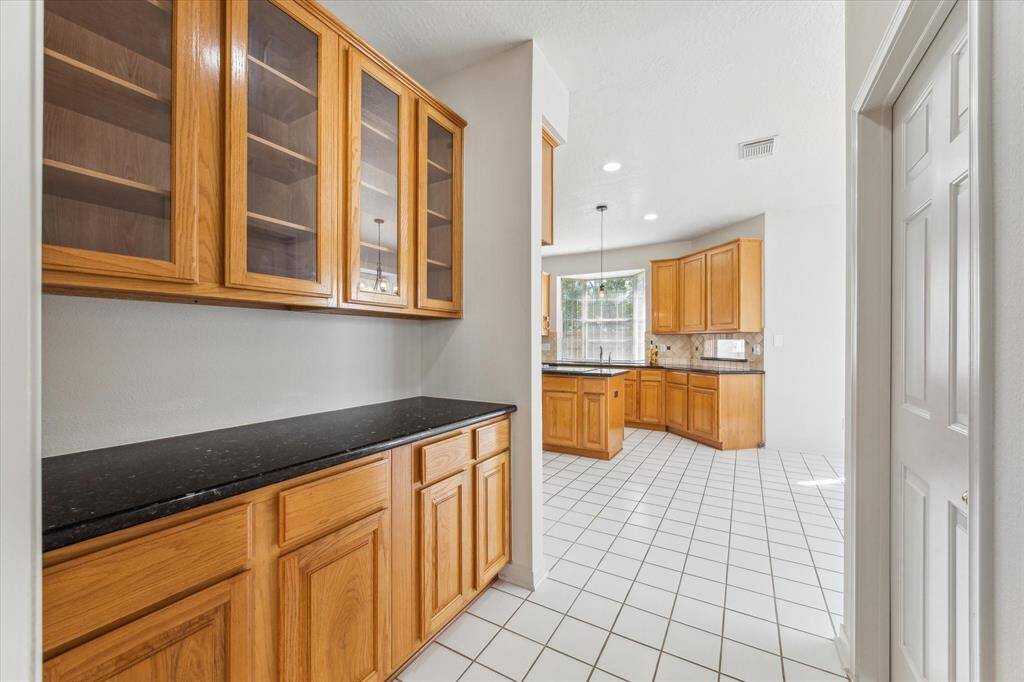 Butler's pantry with lots of storage space.
