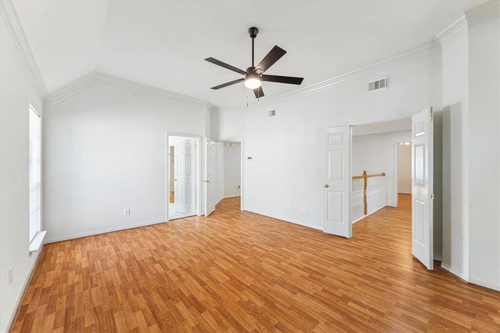 Another view of the primary bedroom.