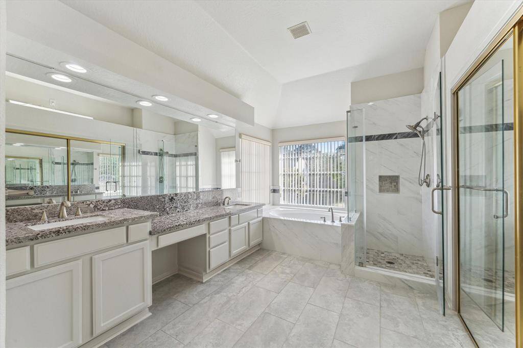 Nicely updated primary bathroom.