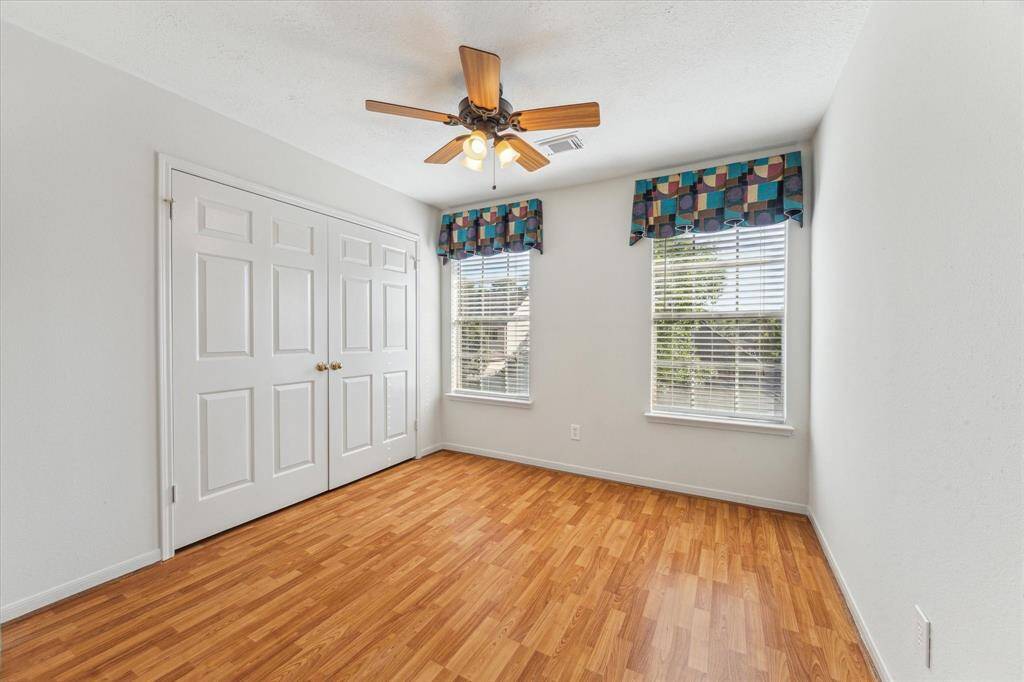 One of three secondary bedrooms.