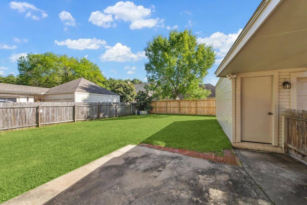 Detached garage with patio and nice size yard.