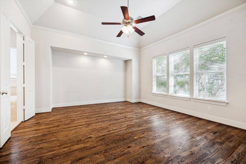 PRIMARY BEDROOM.  It's easy to see from this picture just how stately the primary bedroom suite is.  T