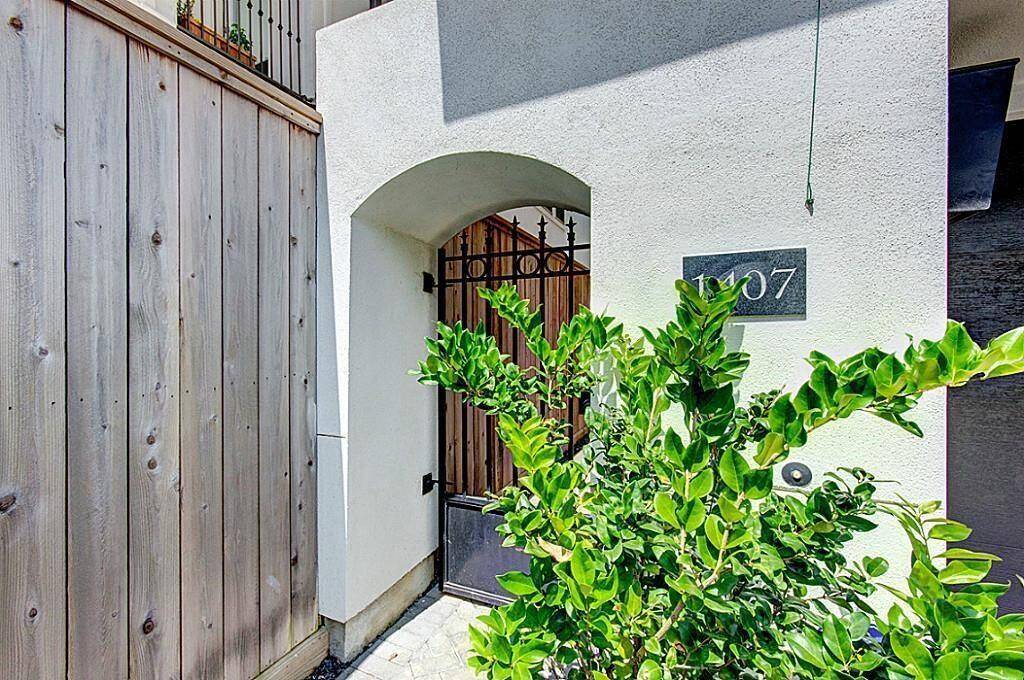 ENTRY. Lockable gate at the front. The front door is down the side of the home.