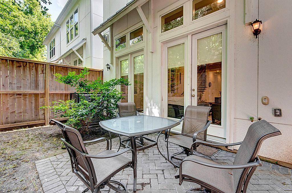 BACKYARD.   Perfect for a table, chairs and BBQ.  Note since this picture was taken, the space has been upgraded and now has gravel around the pavers.