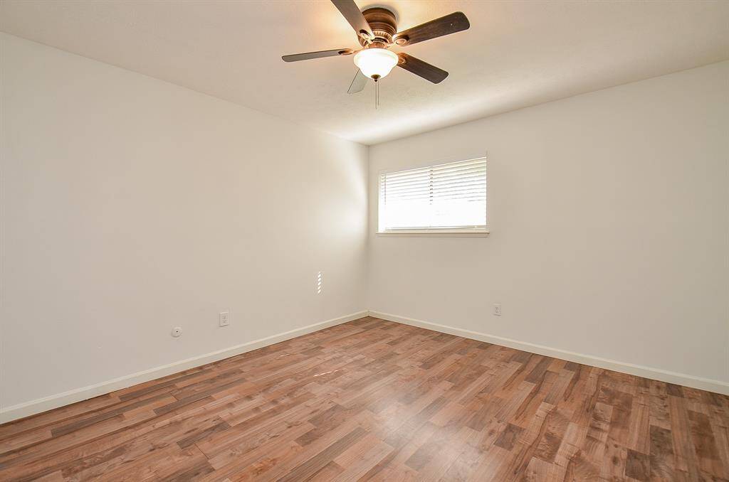 Spacious bedroom with ample closet space.