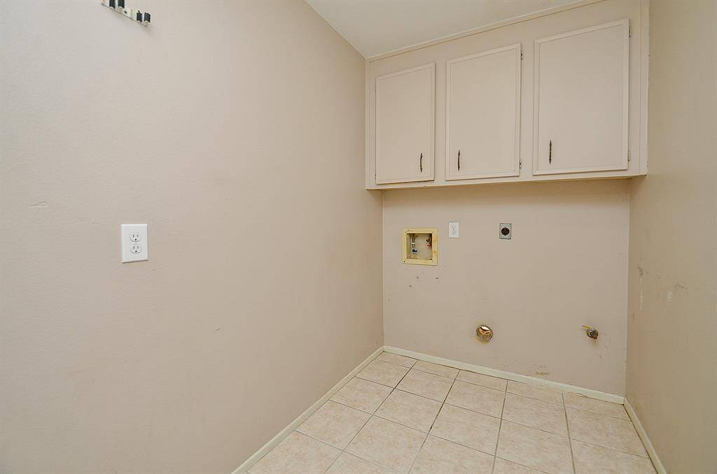 Spacious detached garage with generous parking.