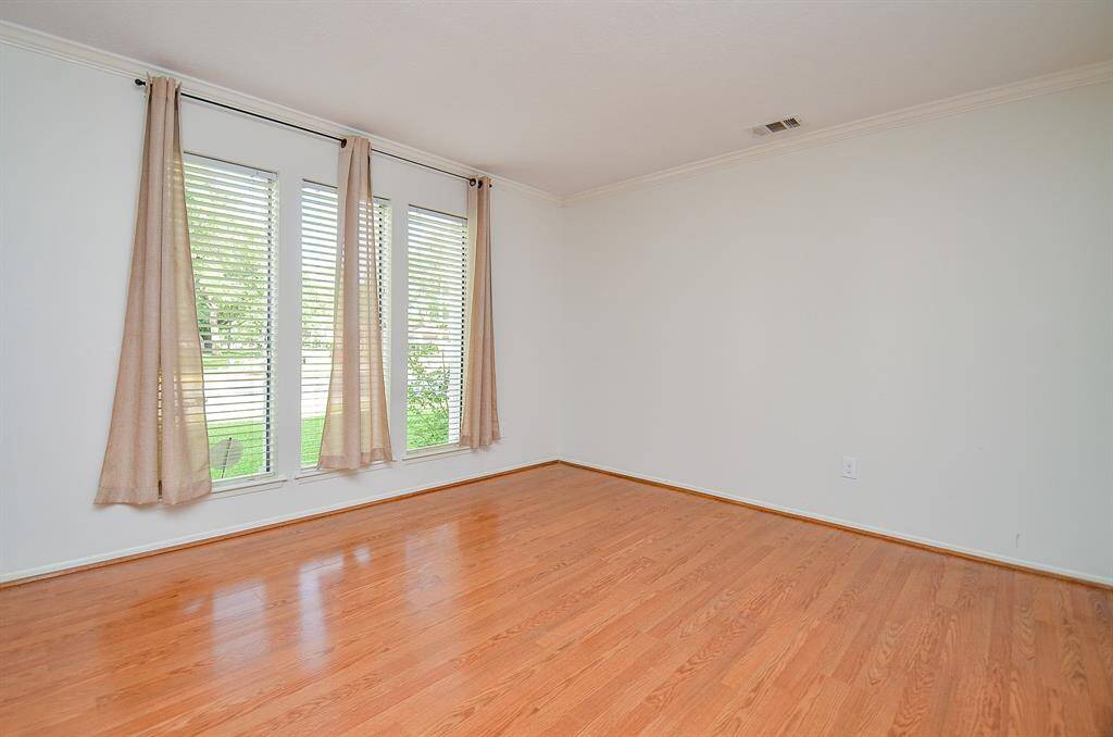 Bright and airy view from the living room into an expansive, versatile space.