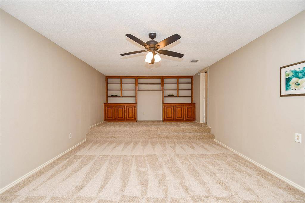 House in rear: media room, can be 4th bedroom