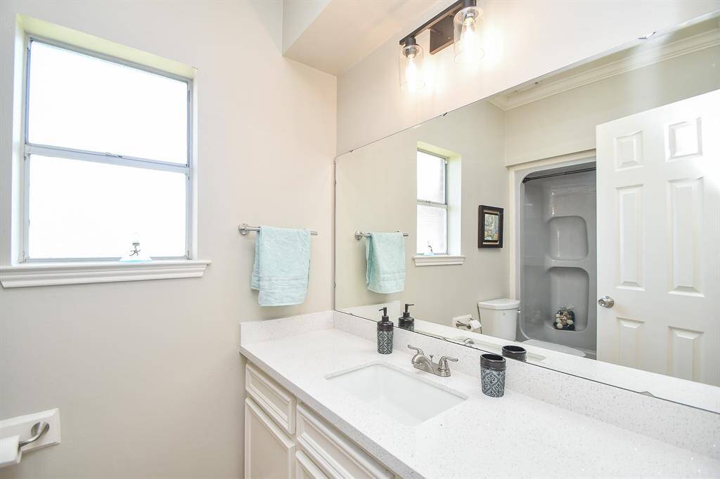 House in front: master bath