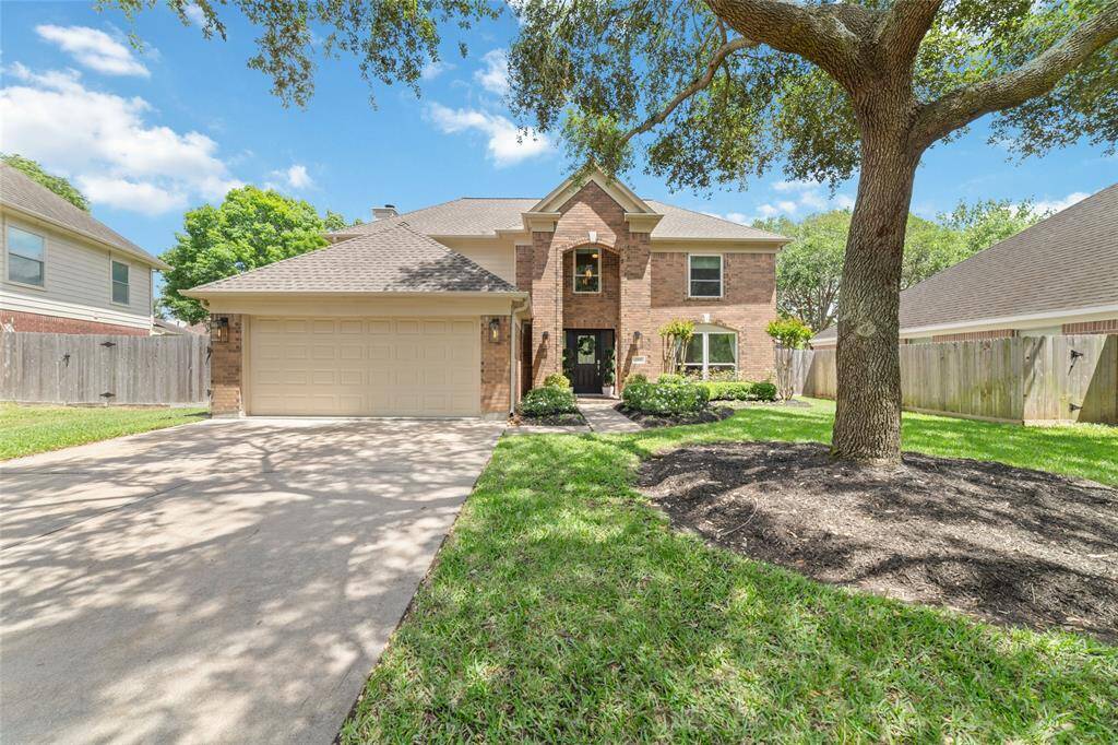 Welcome home to 1411 Maple Moss Court!