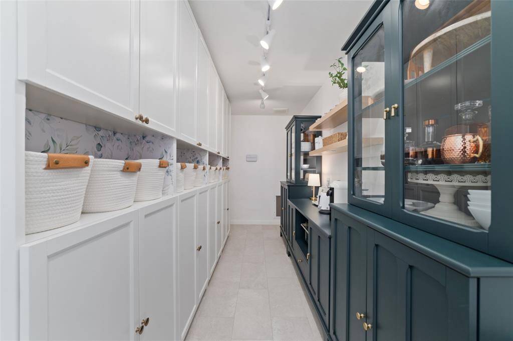 Added mud room with tons of cabinet space, so organized!