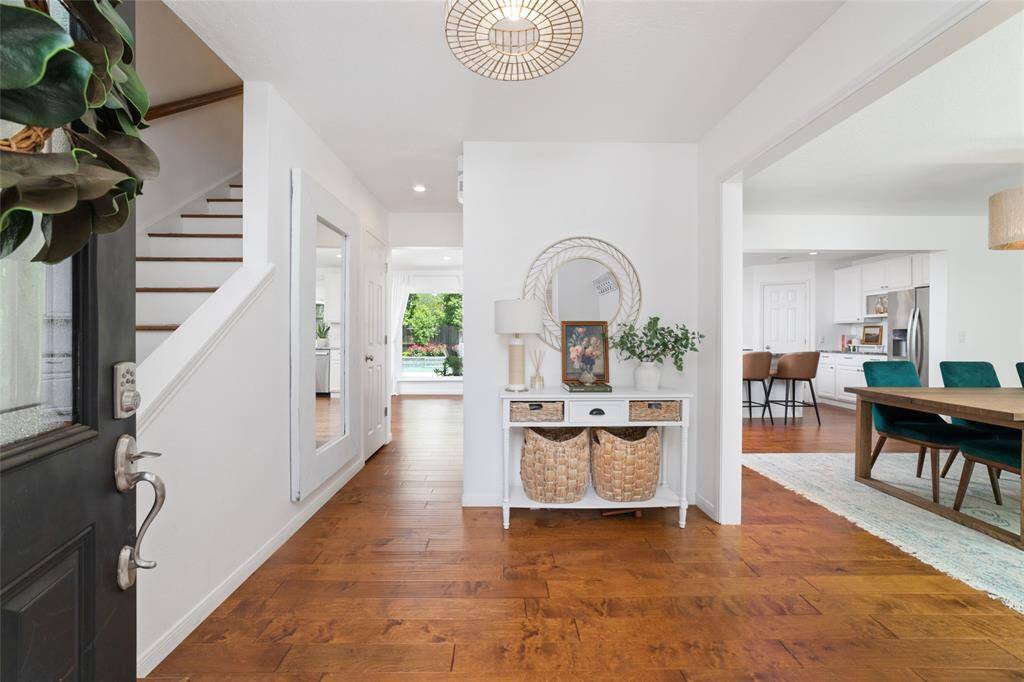 Gorgeous and inviting entrance with engineered wood flooring throughout the first floor!