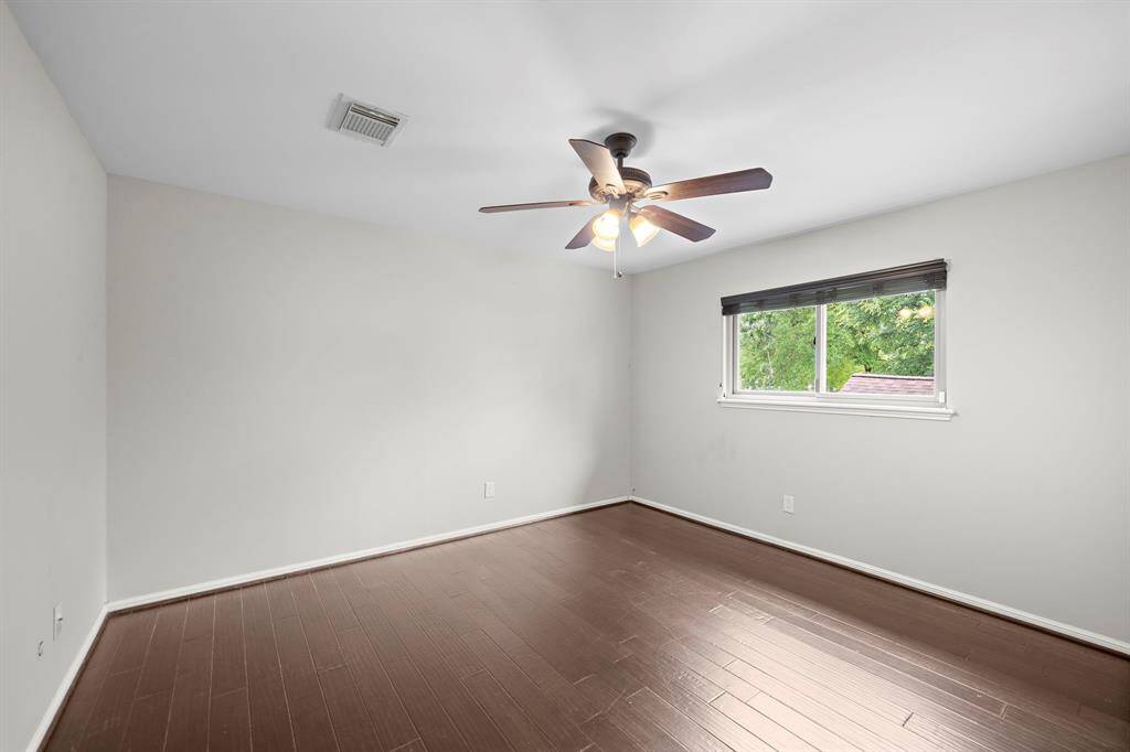 3 spacious secondary bedrooms, with one offering direct balcony access.