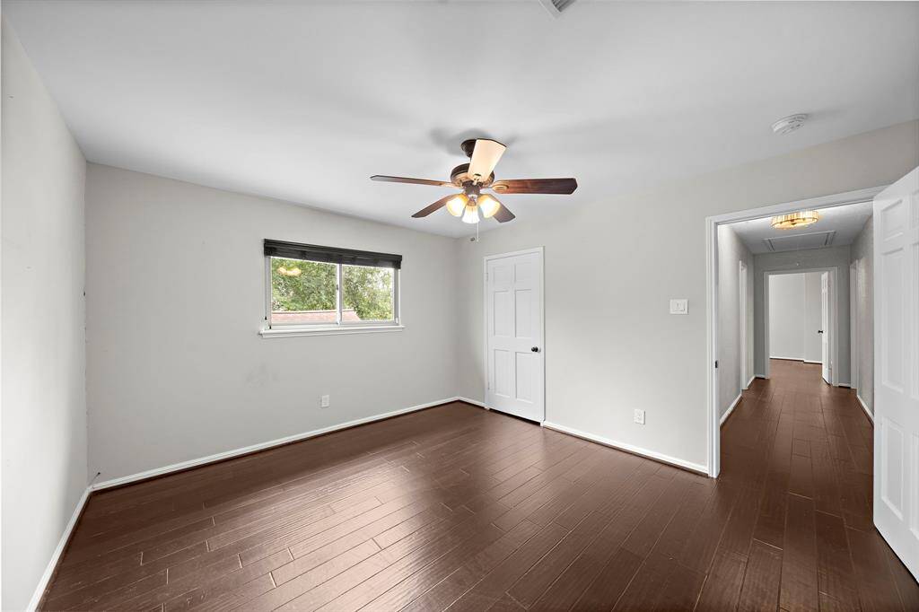 This bedroom offers a laundry closet with washer and electric dryer connections.