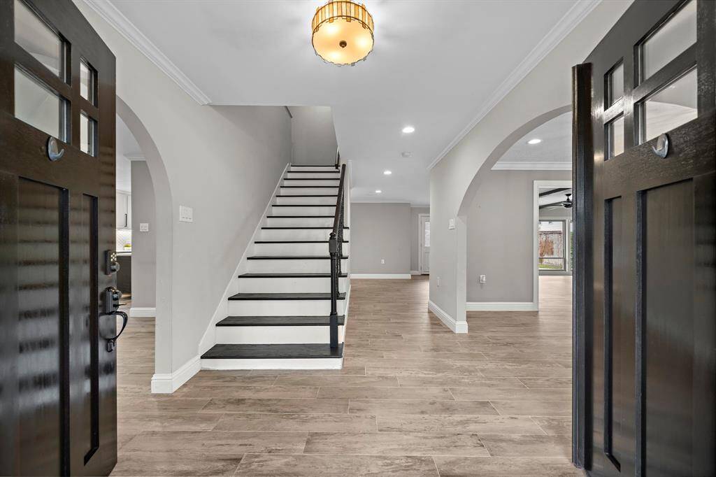Welcome guests with an elegant double door entry.