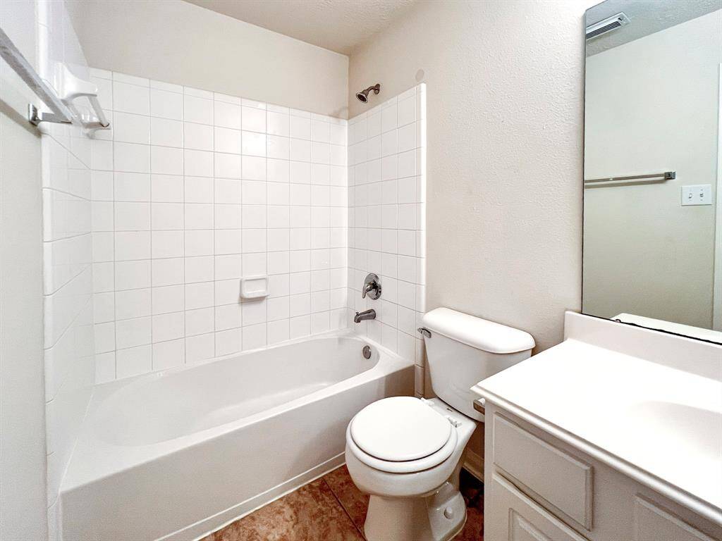 One of the secondary bathrooms upstairs.