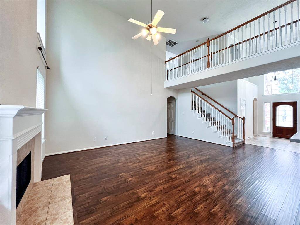 The spacious open layout from the breakfast nook to the inviting family room leads to the elegant front entrance.
