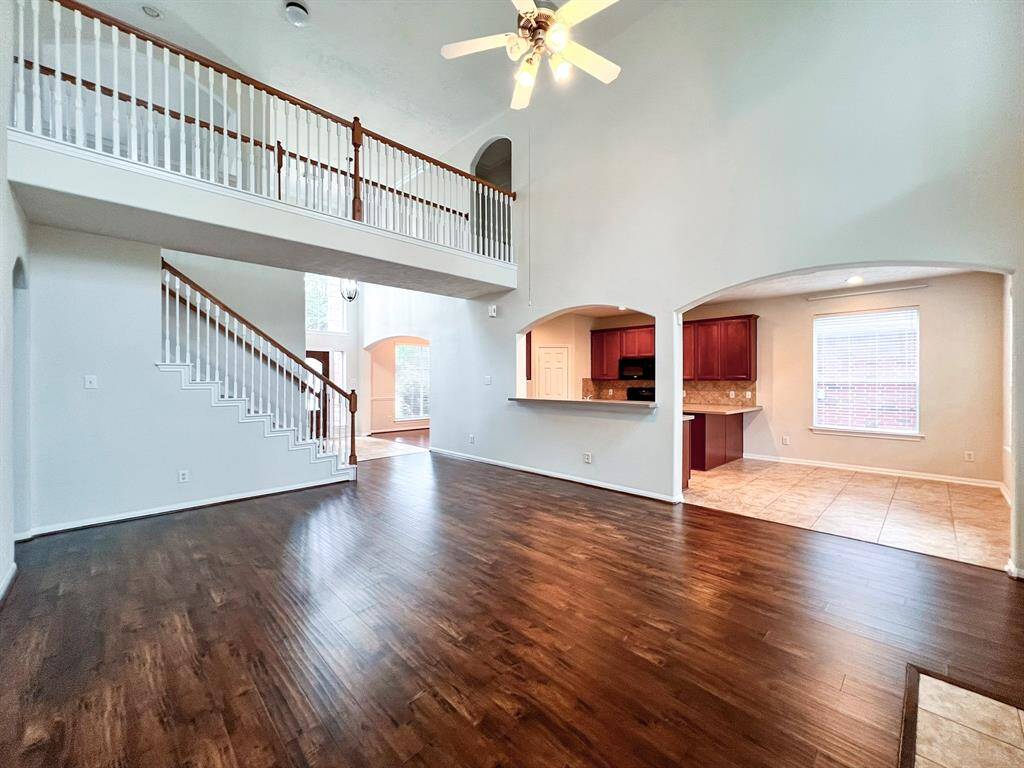 Spacious family room seamlessly connected to the front entrance and kitchen.