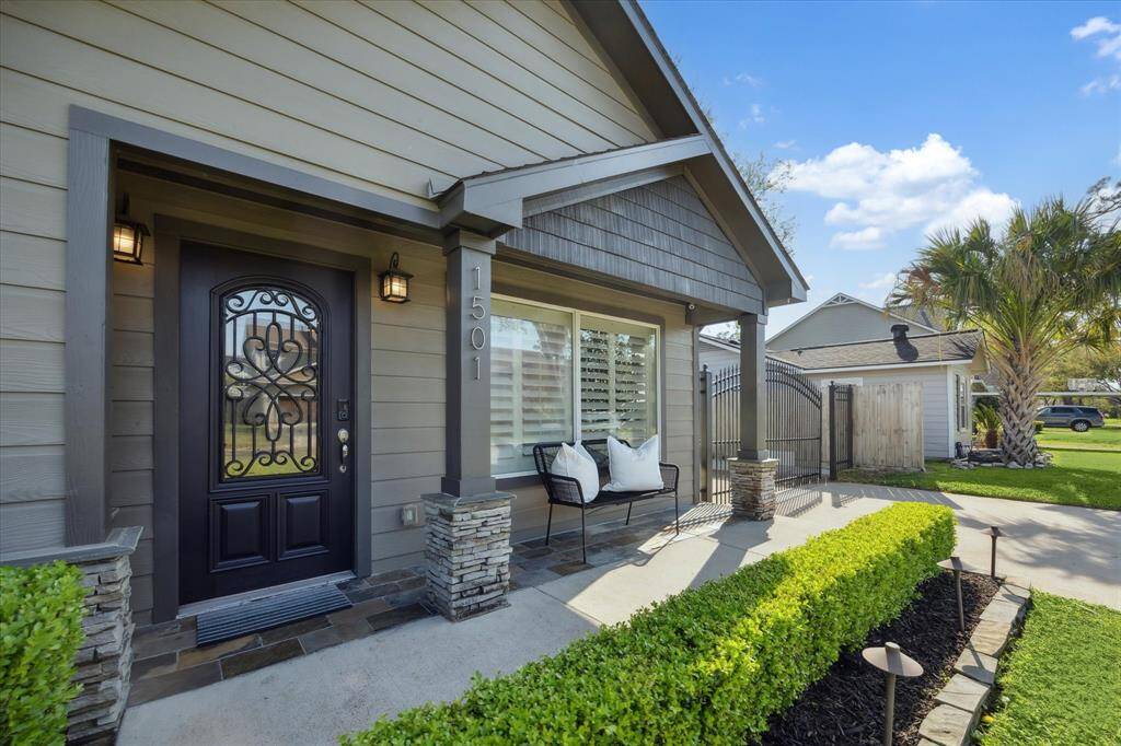 Inviting front porch and lush landscaping.